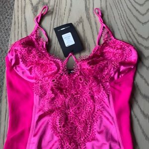 Satin dress with sheer side.  Underwire in dress